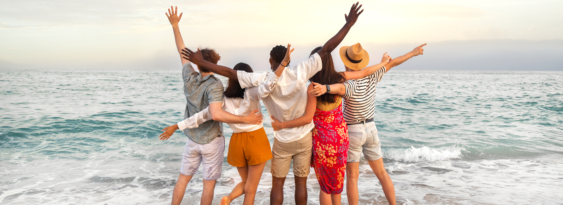 Young Adults Happy to Have Hotel Jobs Viewing the Ocean in Atlantic City, New Jersey